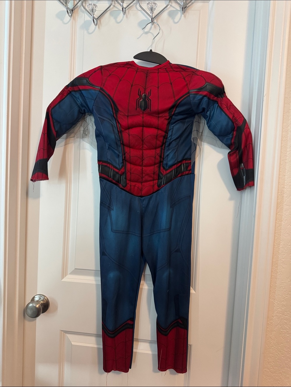 Spider-Man costume boys one Side of the  web is slightly torn
